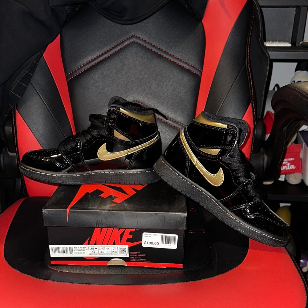 Nike Black and Gold High-Tops